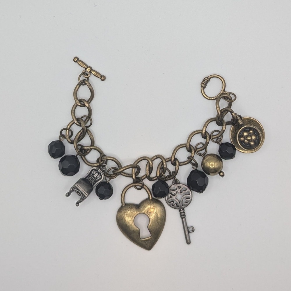 Alice and Wonderland Brass Charm Toggle bracelet